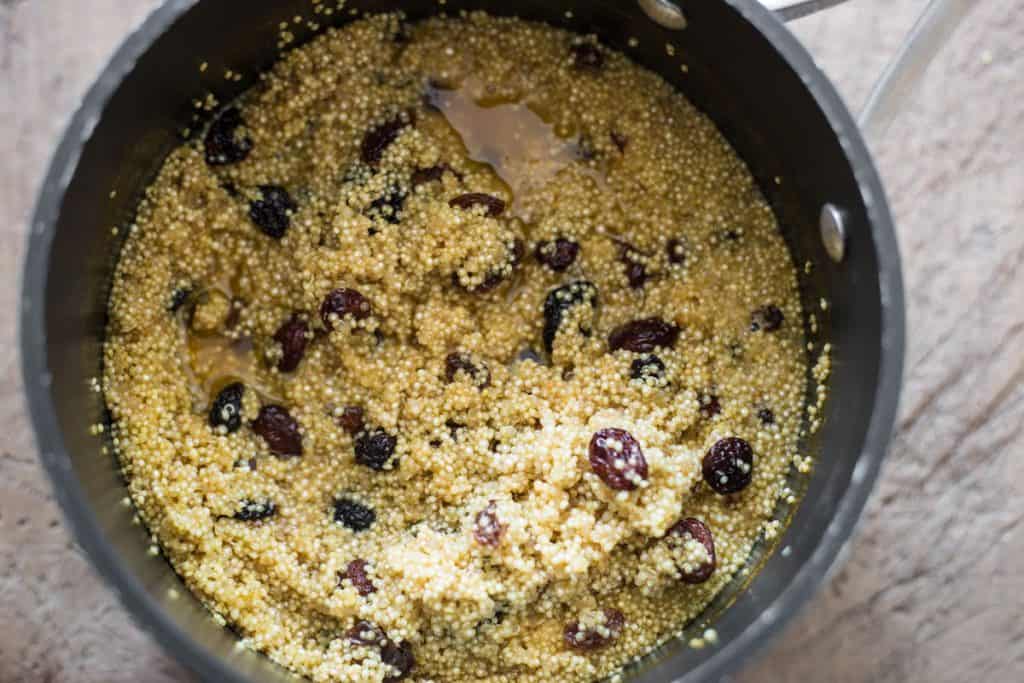 process image of breakfast quinoa in a saucepan