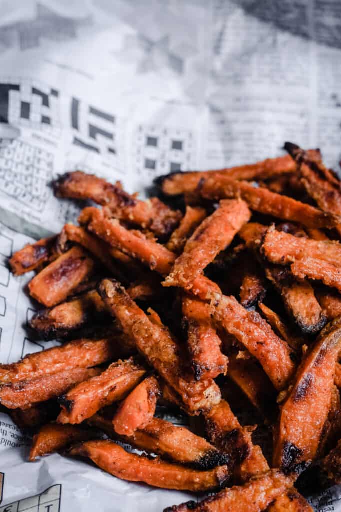 sweet potato fries on newspaper