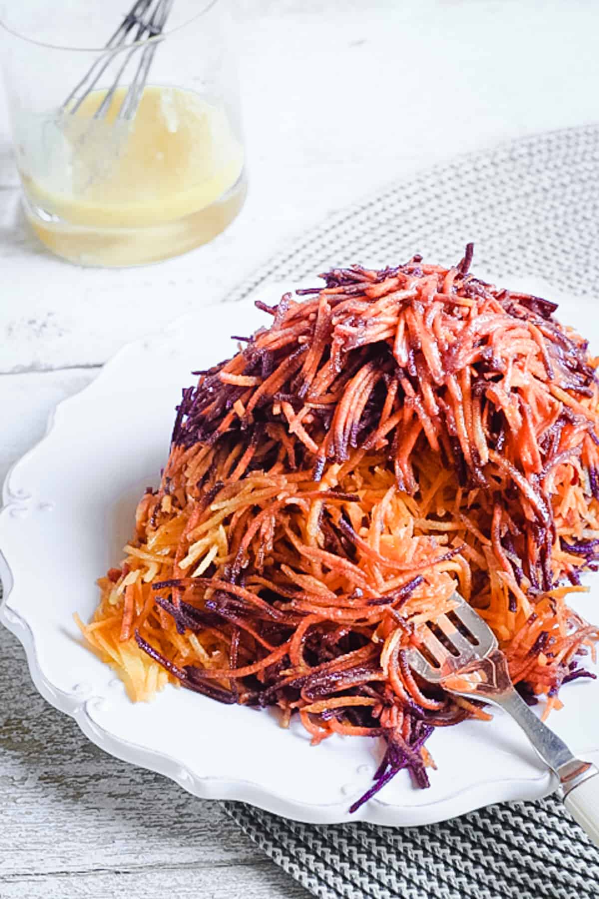 Carrot Salad on a plate with a fork