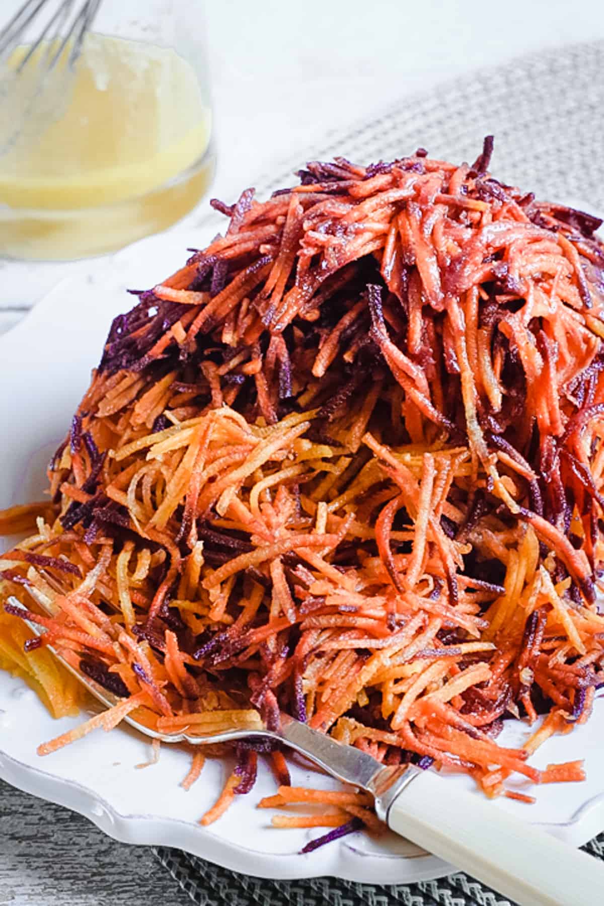 Carrot Salad on a plate with a fork