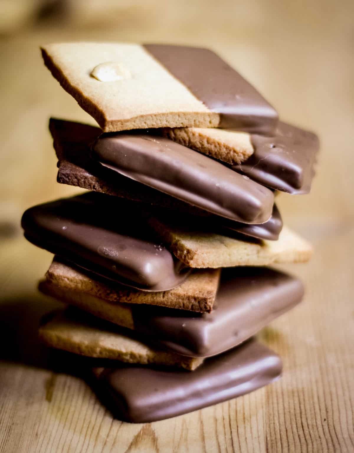 A stack of Chocolate Dipped Peanut Butter Biscuits.
