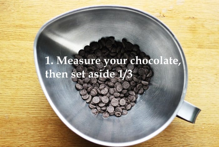 A close up of a bowl of chocolate with the instructions Measure your chocolate, then set aside ⅓