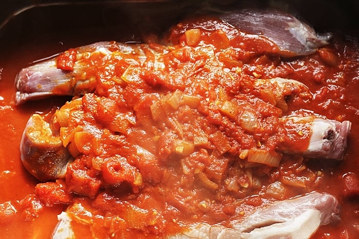 A close up of tomato sauce
