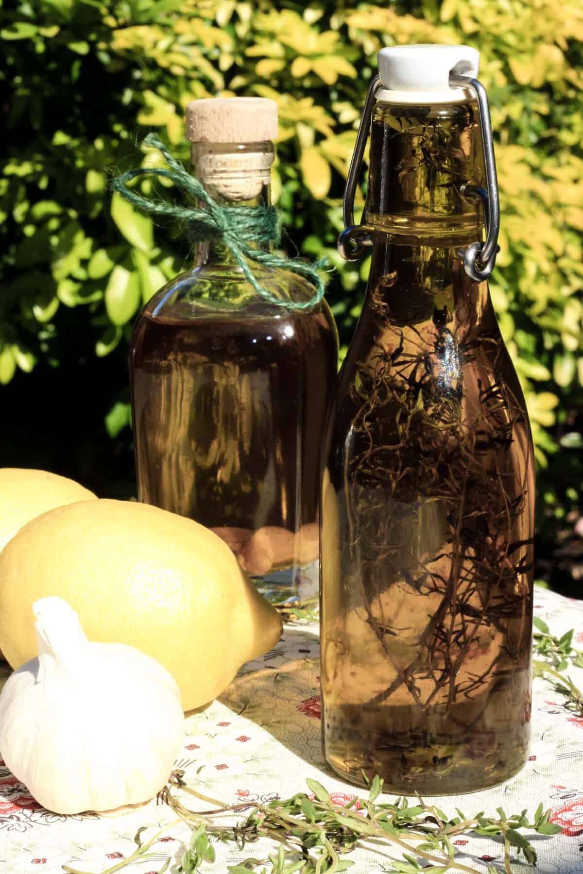 A glass bottle of olive oil on a table