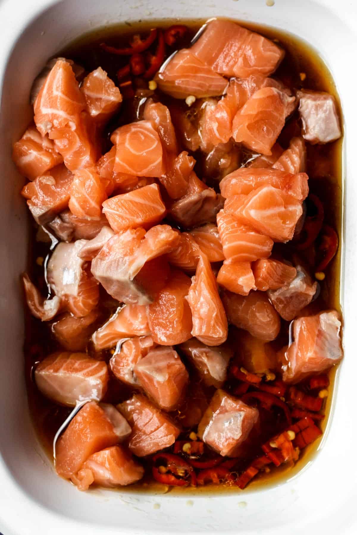 salmon marinating in bowl