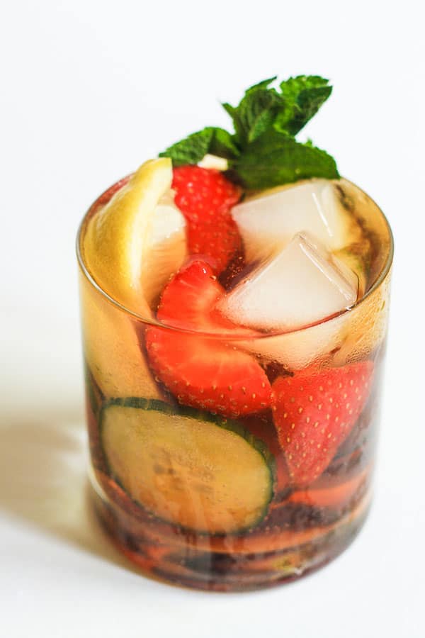 A glass of pimms with fruit
