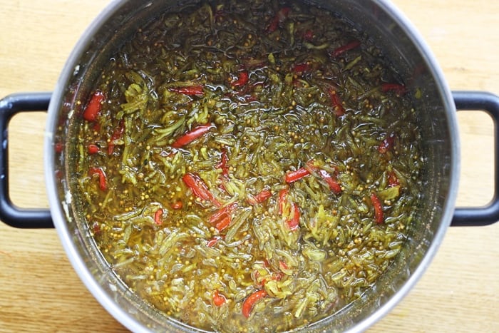 Ingredients for courgette relish in preserving pan