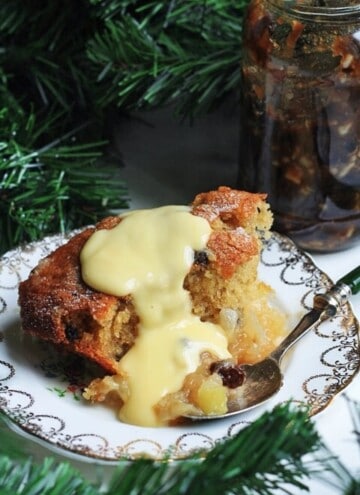 Plate of bramley apple mincemeat pudding with custard