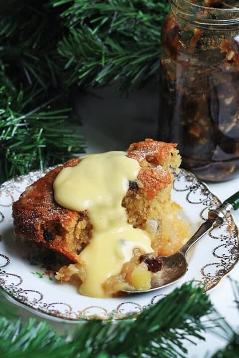 Plate of bramley apple mincemeat pudding with custard