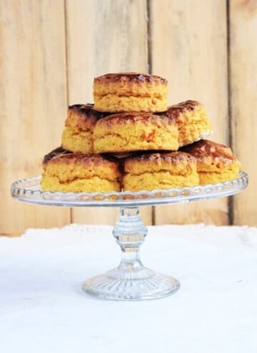 Piles of butternut squash scones on cake stand