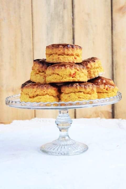 Piles of butternut squash scones on cake stand