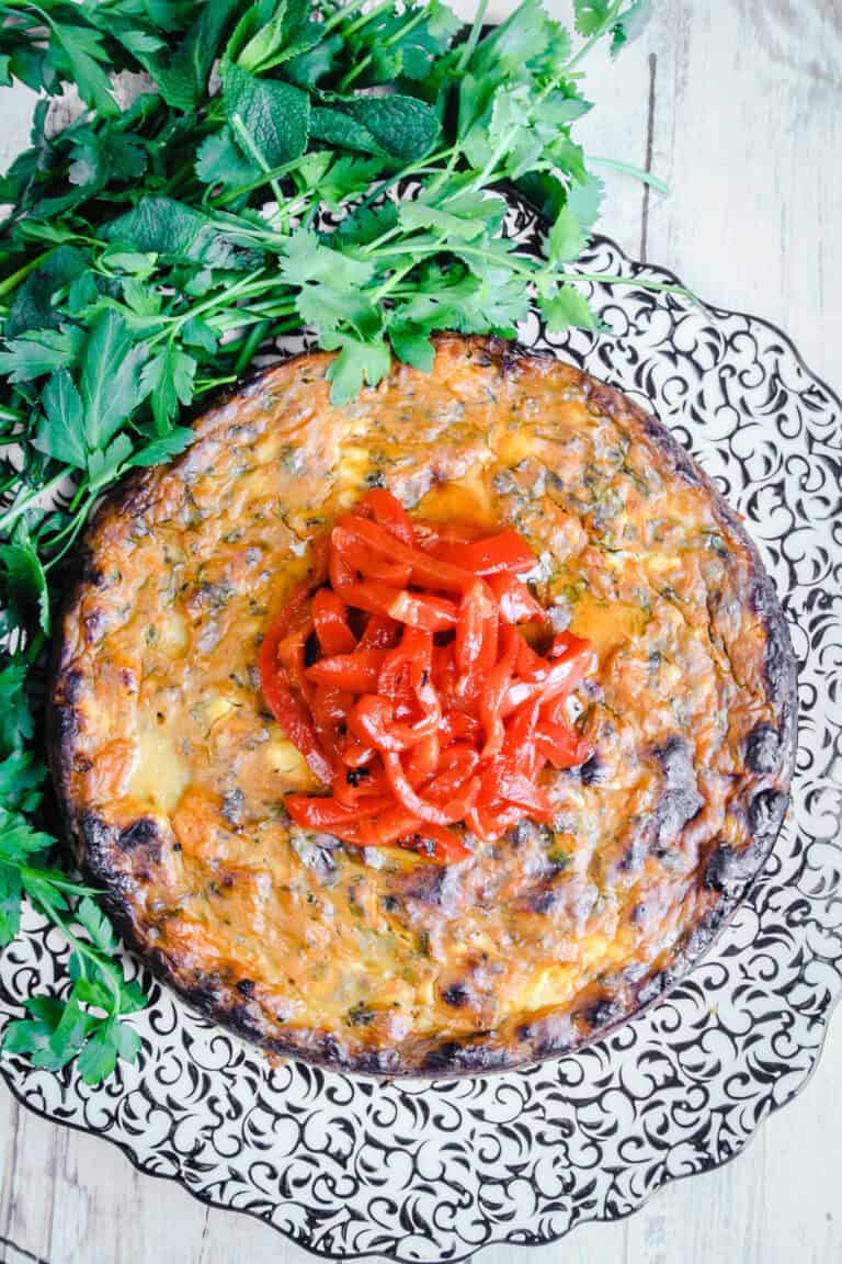 Sweet Potato Omelette with Feta on a plate with salad.