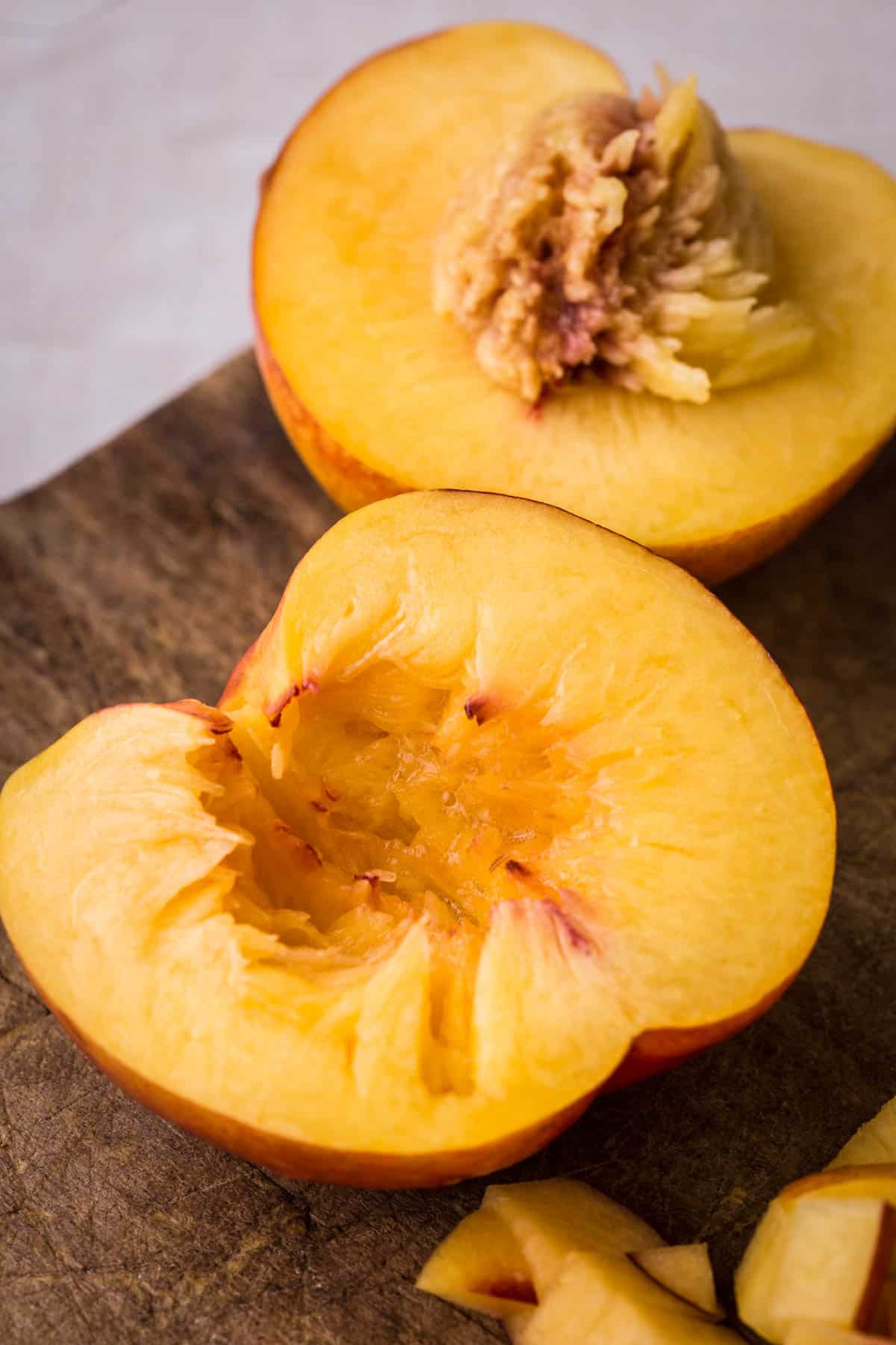 Cut Nectarine on a wooden board