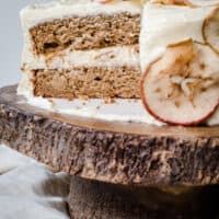 Close up of a cut Apple and Cinnamon Cake with Salted Caramel Cream Cheese Buttercream