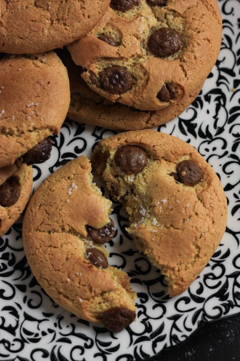 A cookie cut in half on a plate