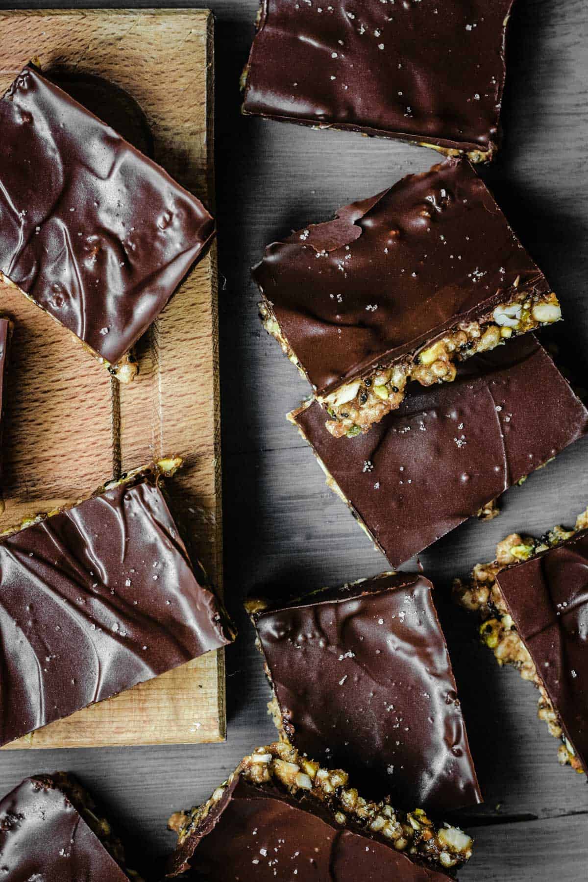 Overhead view of No-Bake Chocolate Salted Energy Bars on a wooden board