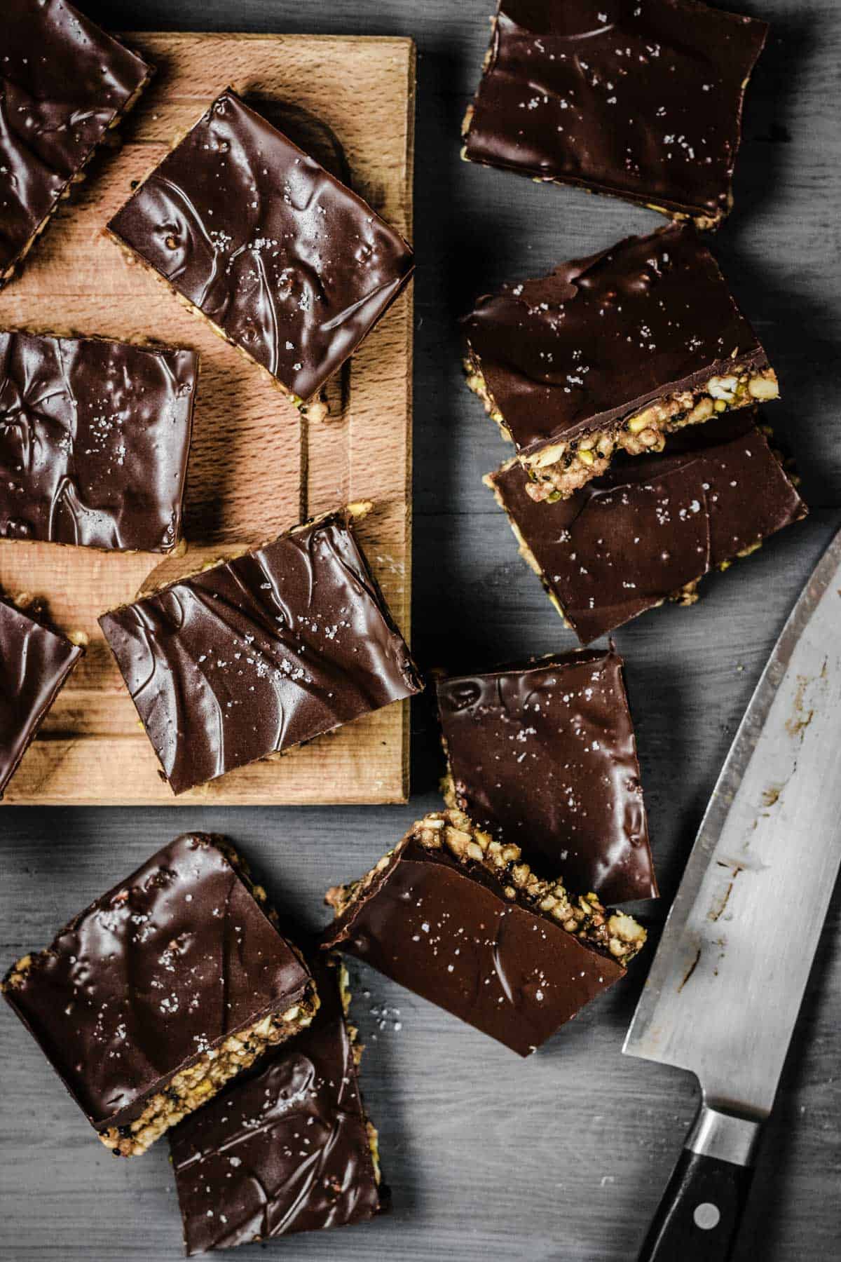 Overhead view of No-Bake Chocolate Salted Energy Bars on a wooden board