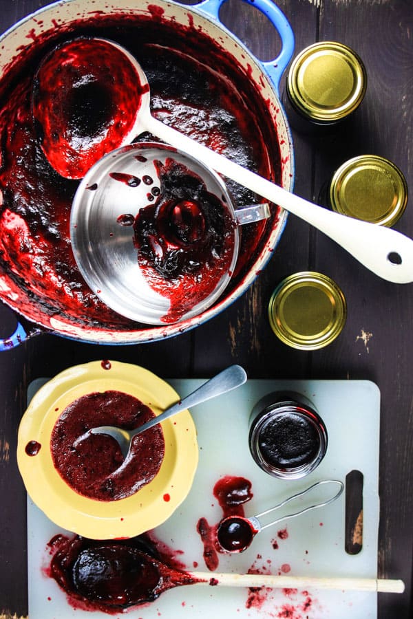 A workstation with utensils for Wild Blackberry Lime Jam