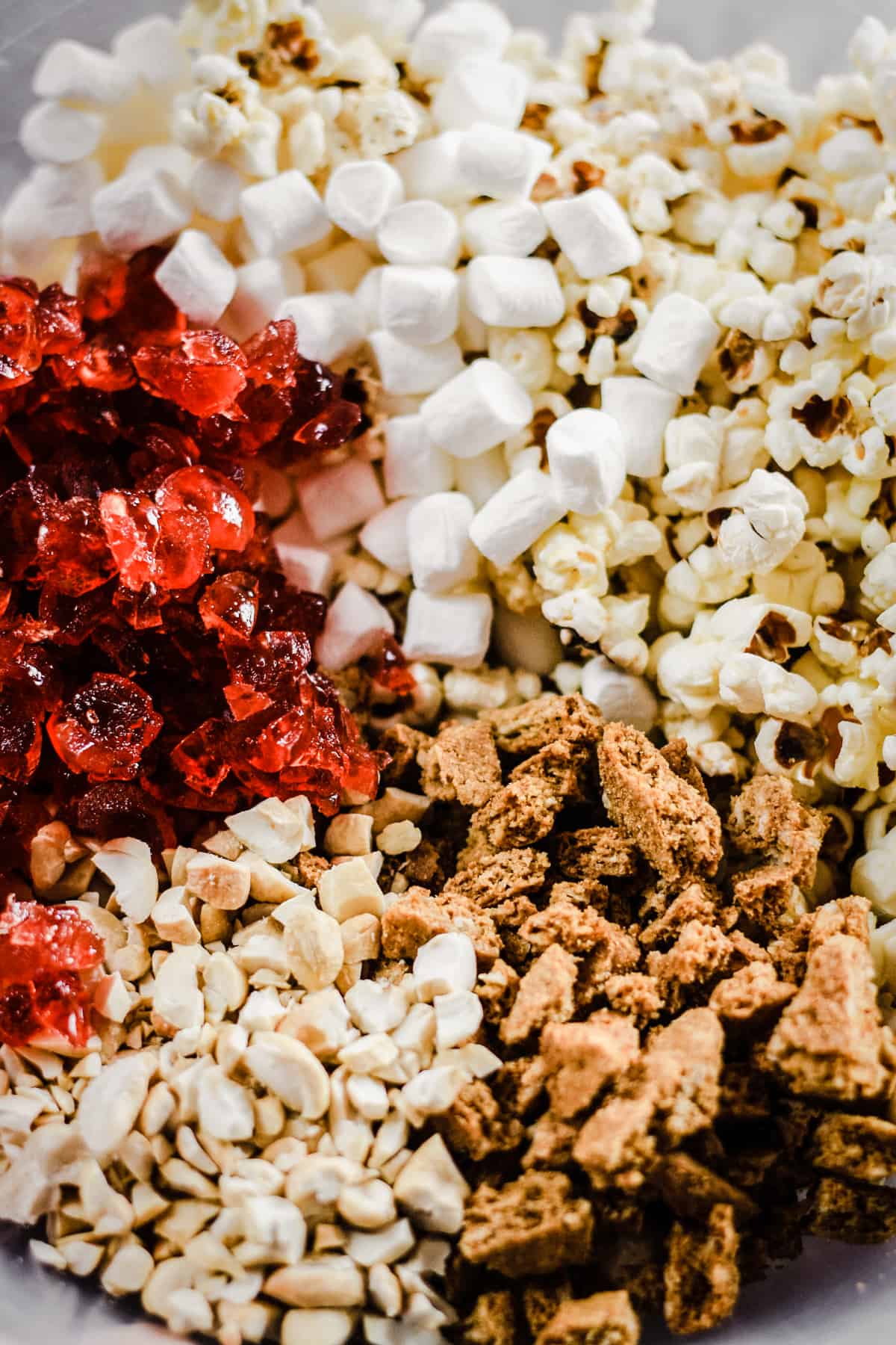 ingredients in a bowl for Ultimate Popcorn Rocky Road