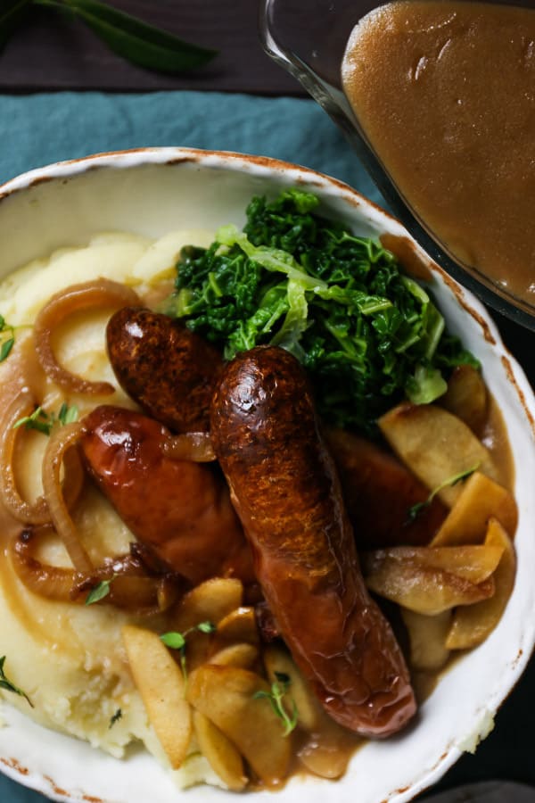 A bowl of sausage and mash