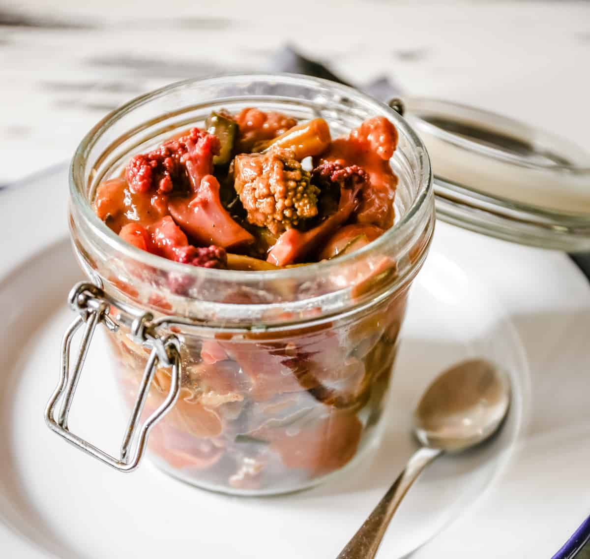 Jar of piccalilli on a plate