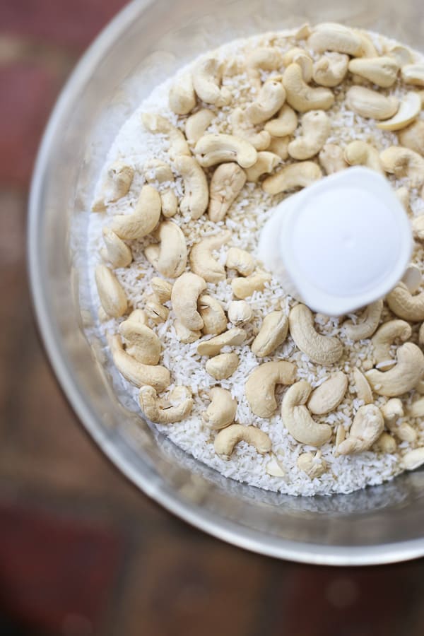 A close up of ingredients for energy balls in food processor