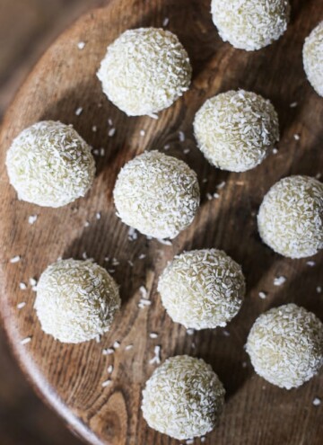 coconut lime energy balls on wooden table