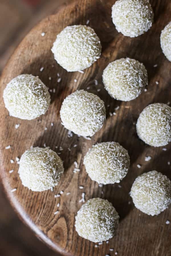 coconut lime energy balls on wooden table