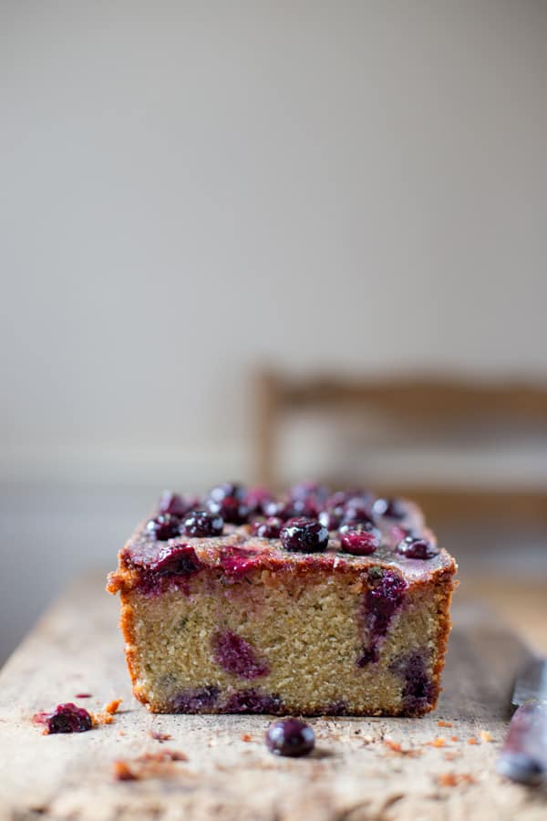 blueberry cake on a wooden board