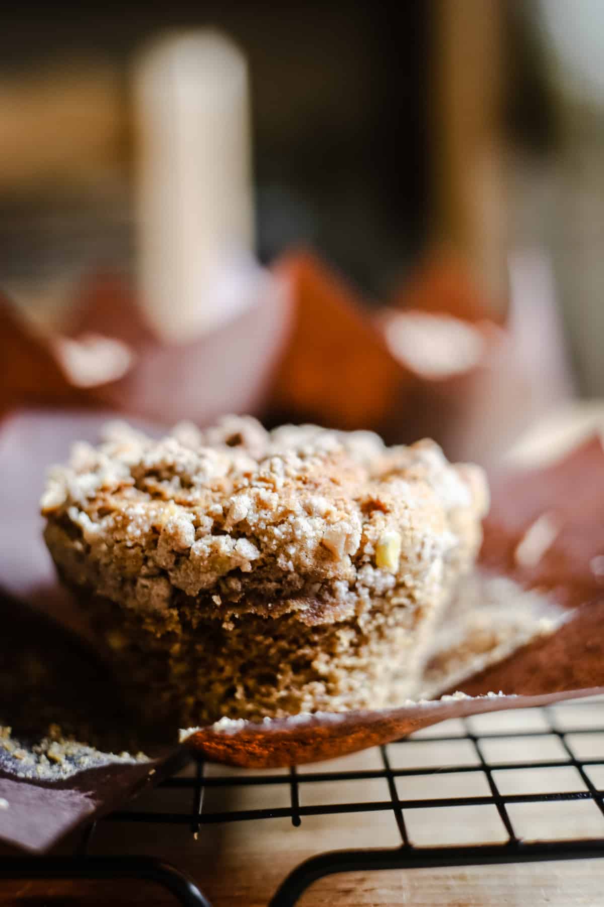 Banana Peanut Butter Streusel Muffin on a cooling rack