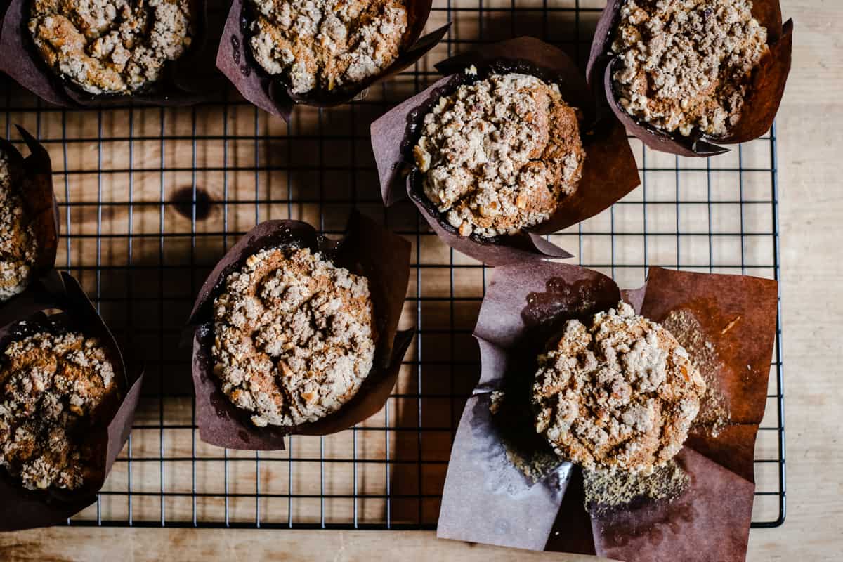 Banana Peanut Butter Streusel Muffins on a cooling rack