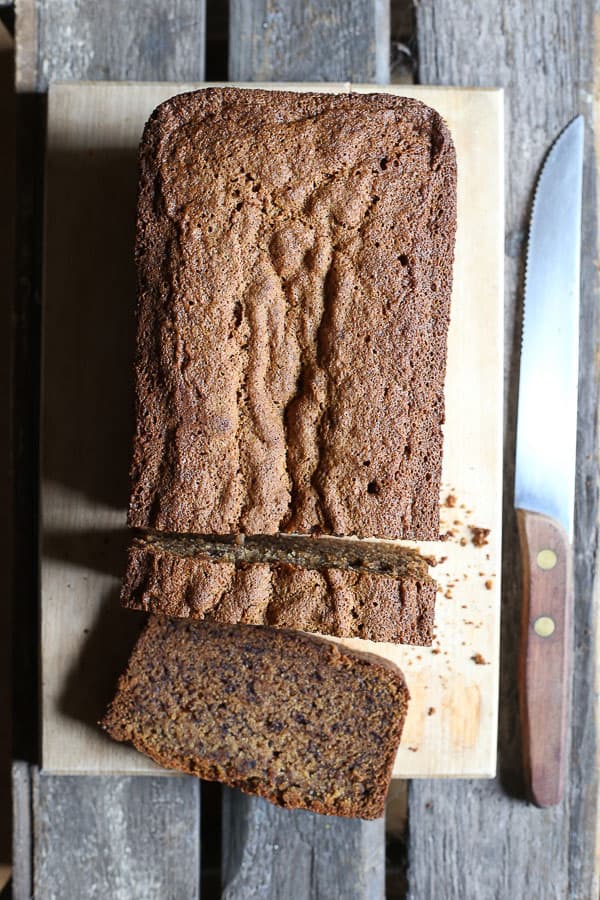 Easiest Gluten-Free Banana Bread sliced on wooden board