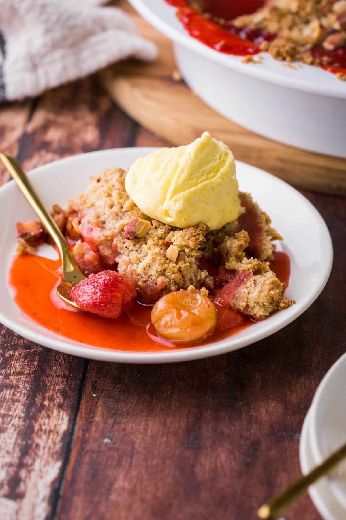 Overhead images of a dish of Strawberry Gooseberry Crumble