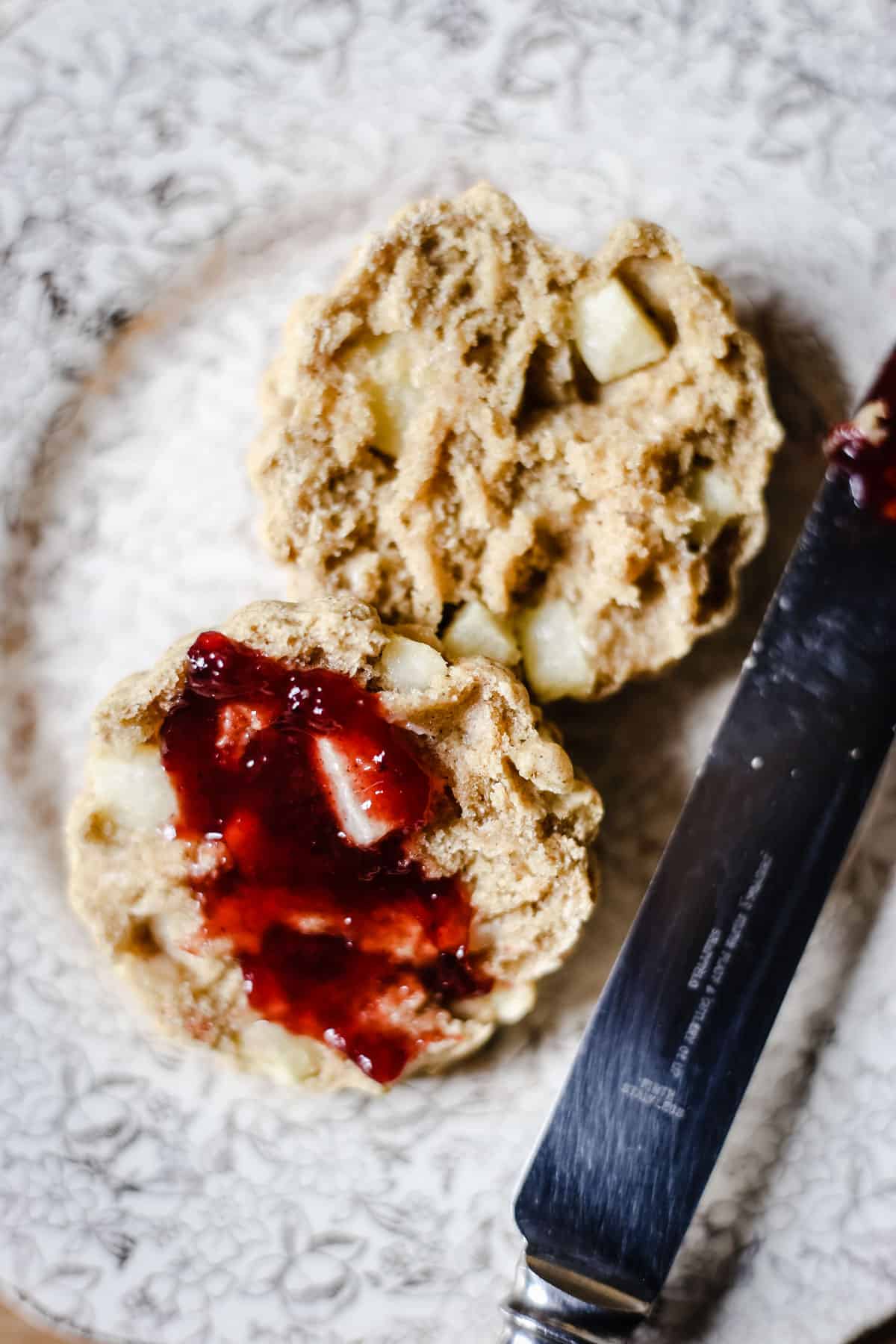 apple scone halved with jam spread on top