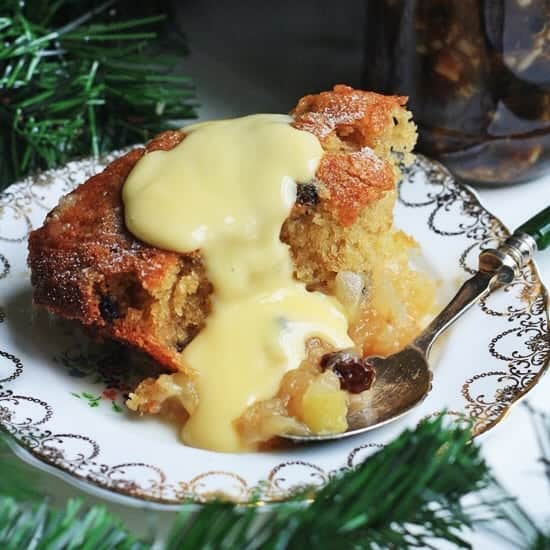 A plate of bramley apple mincemeat pudding with custard