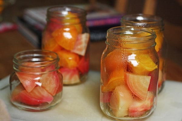 glass jar of beetroots on a table