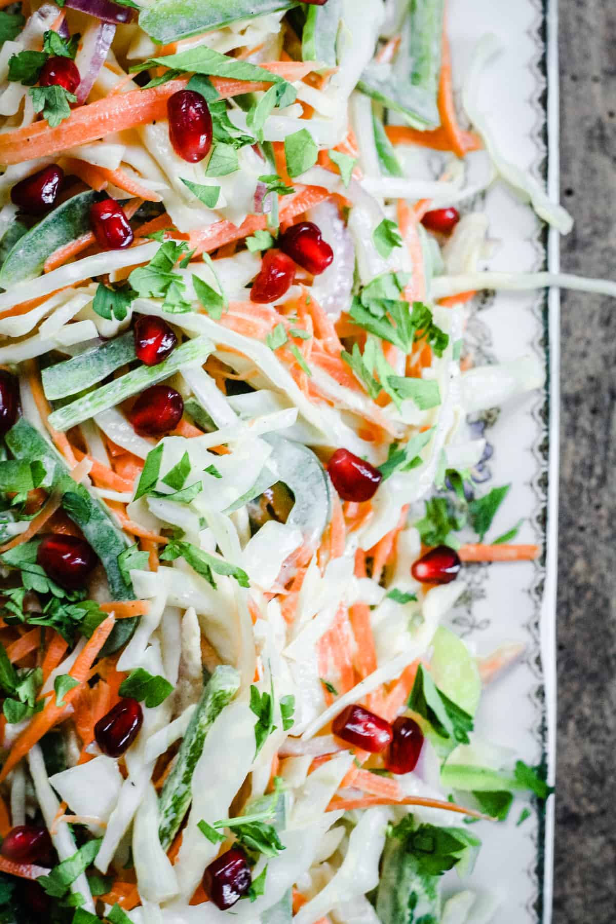 Coleslaw heaped on a plate on a table