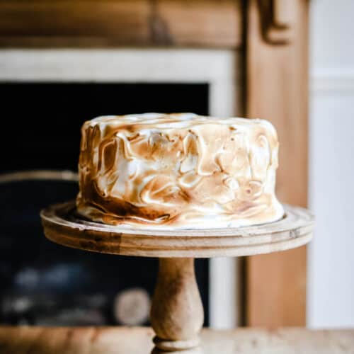 pumpkin cake on a cake stand