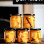 Jars of pickled golden beetroot stacked with title text above.