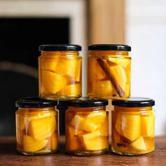 pickled golden beetroot in jars stacked