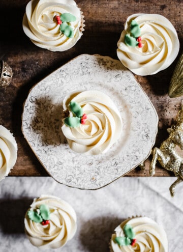 Mince Pie Cupcakes from above surrounded by Christmas decorations