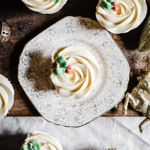Mince Pie Cupcakes from above surrounded by Christmas decorations