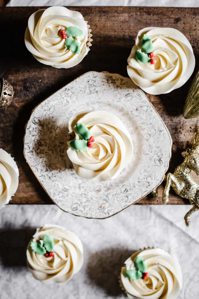 Mince Pie Cupcakes from above surrounded by Christmas decorations