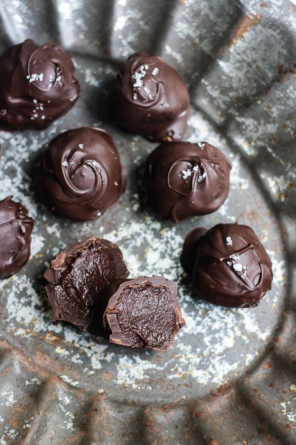 Fleur de Sel Olive Oil Chocolate Truffles on metal tray, one cut open