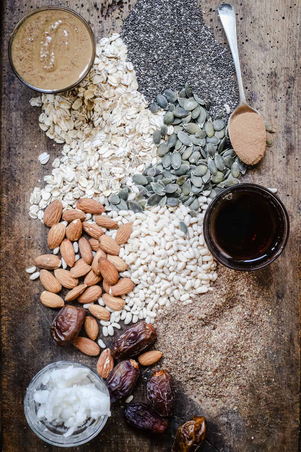 A close up of ingredients for granola bars on a table