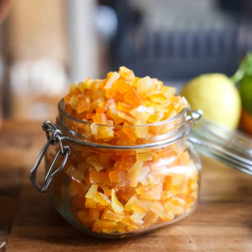 jar of homemade mixed peel on a wooden table