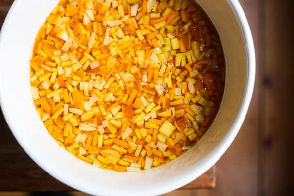 Homemade Mixed Peel in soaking syrup in a large bowl