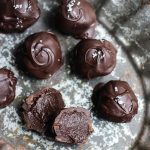 Fleur de Sel Olive Oil Chocolate Truffles on metal tray, one cut open