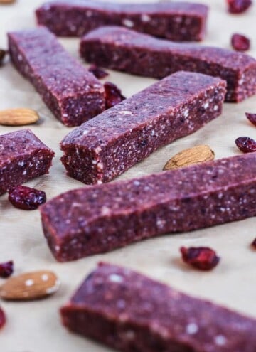 Raw Cranberry and Nut Energy Bars on baking parchment