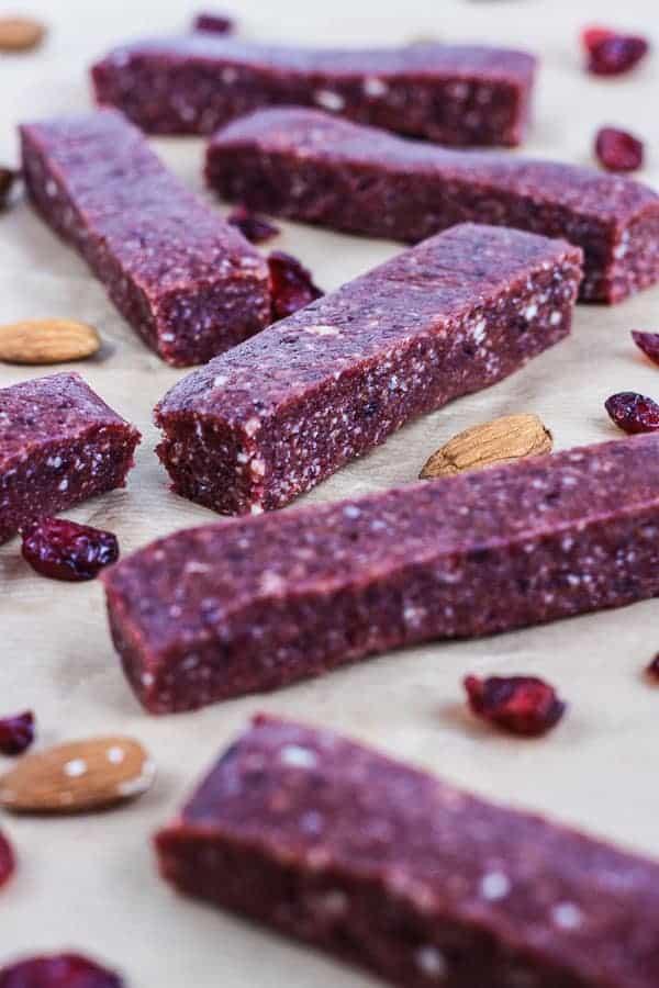 Raw Cranberry and Nut Energy Bars on baking parchment